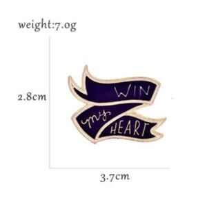 Win My Heart Black & Gold Ribbon Pin Brooch